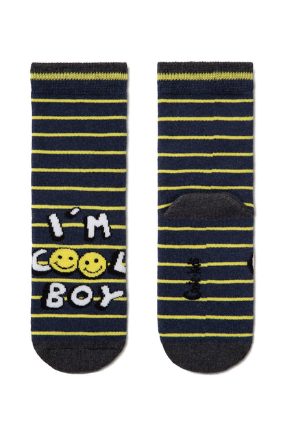 A pair of navy blue socks with thin yellow horizontal stripes, featuring the text "I'M COOL BOY" with yellow smiley faces on the front and solid grey heels and cuffs.