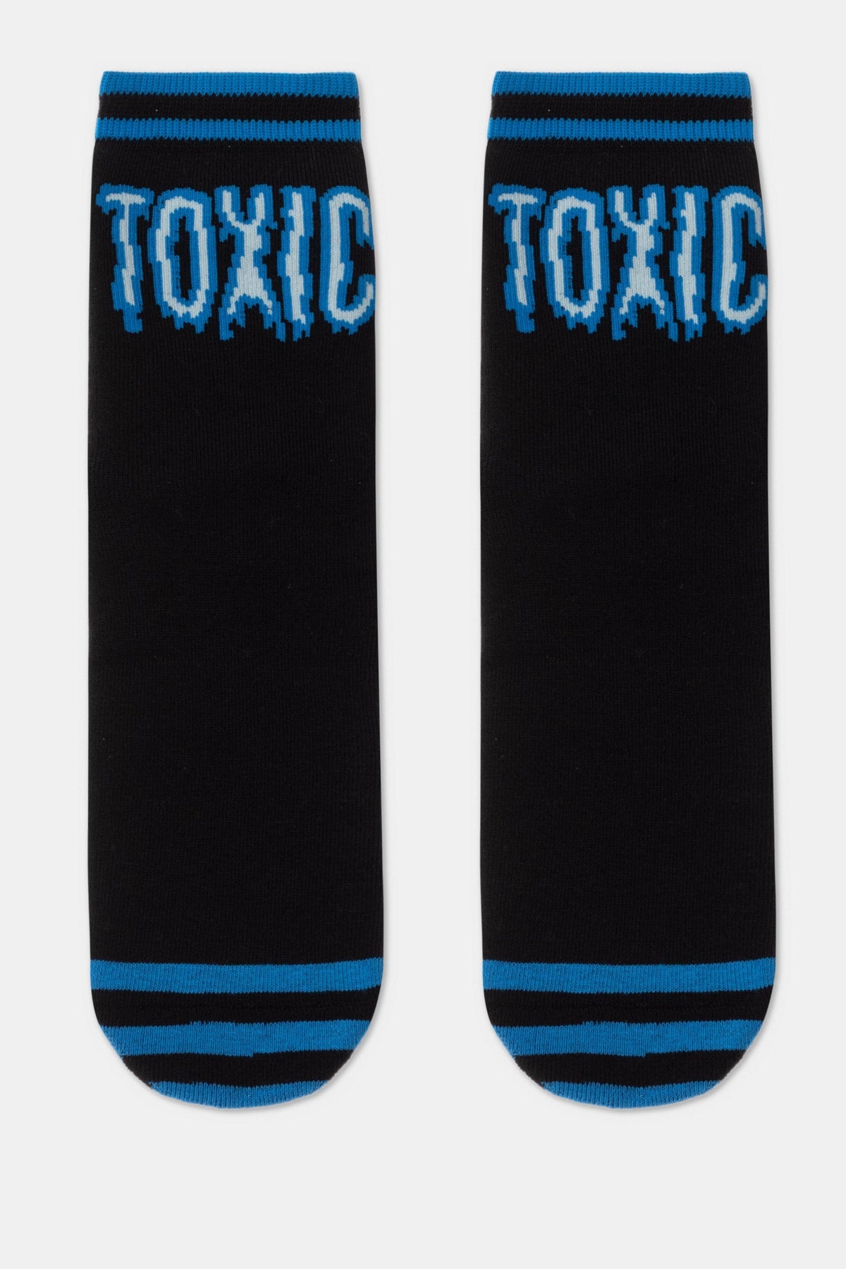 A pair of black crew socks featuring the word TOXIC in blue and white lettering at the top and blue striped cuffs at the top and bottom.