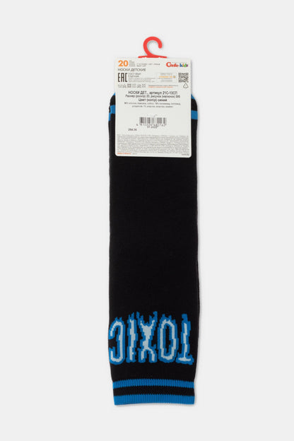 A pair of black crew-length children's socks featuring blue horizontal stripes at the cuff and the word TOXIC written in blue block letters near the toe, hanging on a retail cardboard display tag.