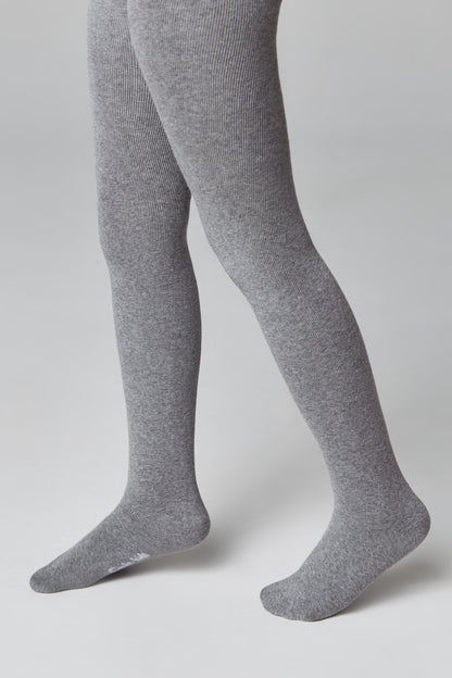 A pair of grey ribbed tights worn on a person's legs against a plain light background.