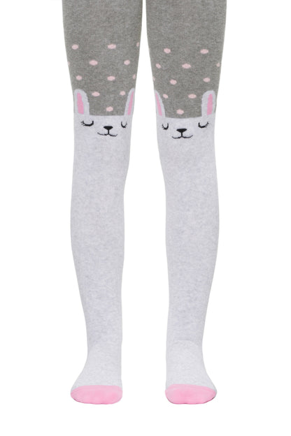 Grey and white children's tights feature a polka dot pattern on the thighs and a cute sleepy bunny face design on each knee with pink accents on the ears and toes.