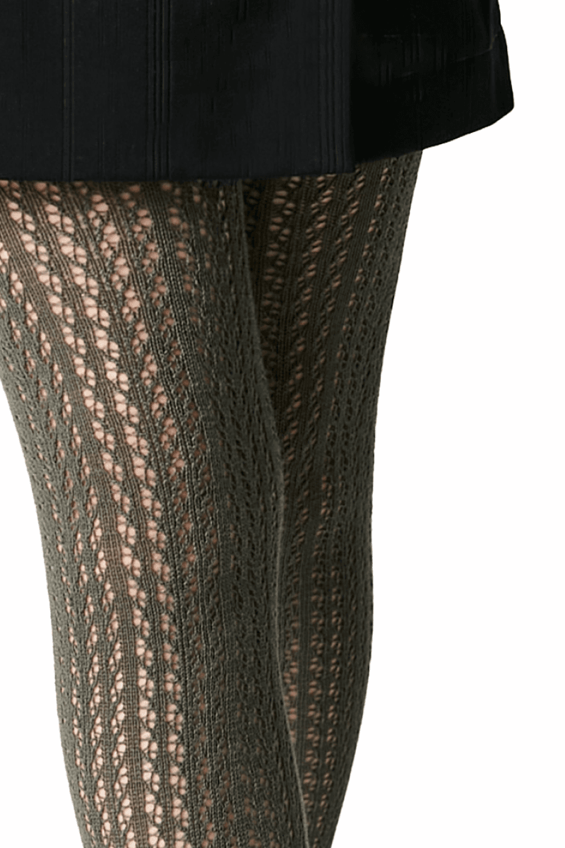 Olive green knit tights with a vertical openwork pattern worn under a black skirt.