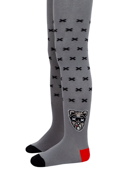 Grey children's tights featuring a black X pattern, a cartoon dog wearing sunglasses on one leg, and black toe and red heel accents.