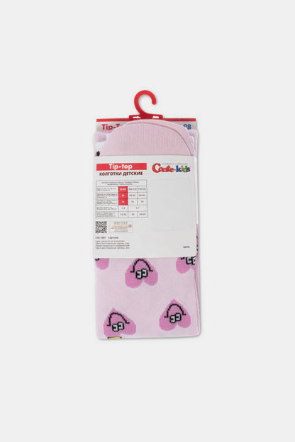 Pink children's tights featuring a repeating pattern of white hearts with black outlines and pink centers, displayed on a cardboard hanger with a size chart.