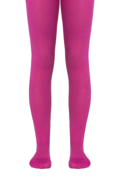 A pair of opaque magenta tights on legs against a white background.