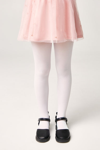 A pair of white tights worn with a light pink tutu skirt and black Mary Jane shoes against a plain white background.
