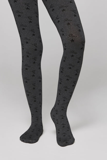 A pair of dark grey glittery tights patterned with black stars and the cursive word stars set against a plain light background.