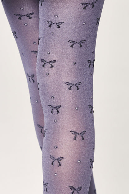 Grey tights featuring a repeating pattern of small black bows and tiny silver shimmering dots.