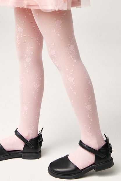 Light pink floral patterned tights worn with black Mary Jane shoes.