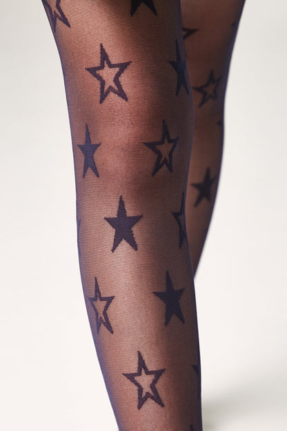 Sheer navy blue tights featuring a repeating pattern of dark blue outlined and solid star icons.