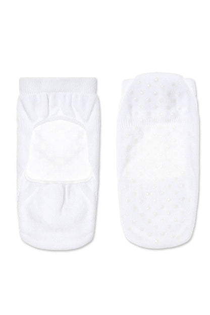A pair of white, low-cut socks displayed against a white background, with the left sock showing the top side and the right sock showing the underside featuring small, clear non-slip silicone grips.