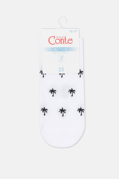 A pair of white ankle socks patterned with small black palm tree silhouettes and topped with a branded cardboard packaging tag.