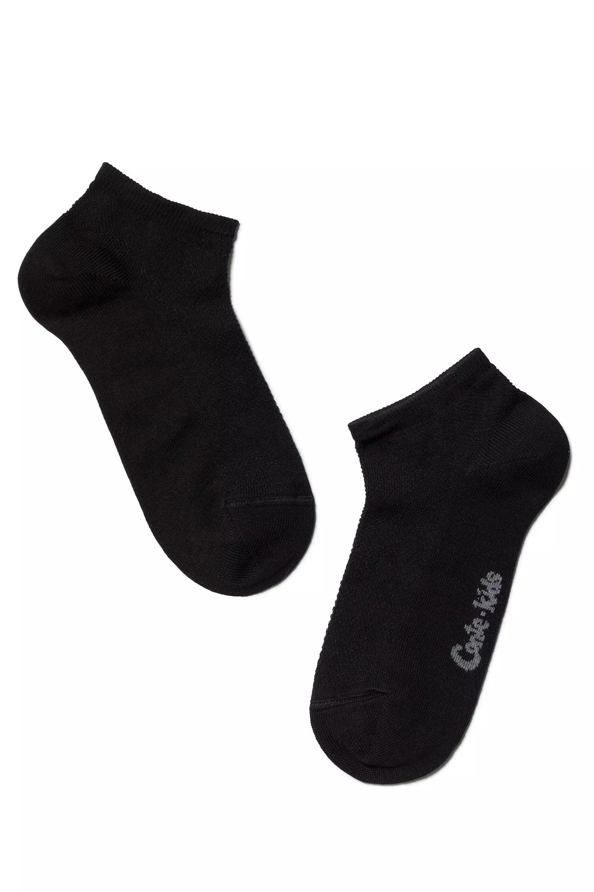 A pair of black ankle socks are displayed against a plain white background, with a grey logo visible on the side of one sock.