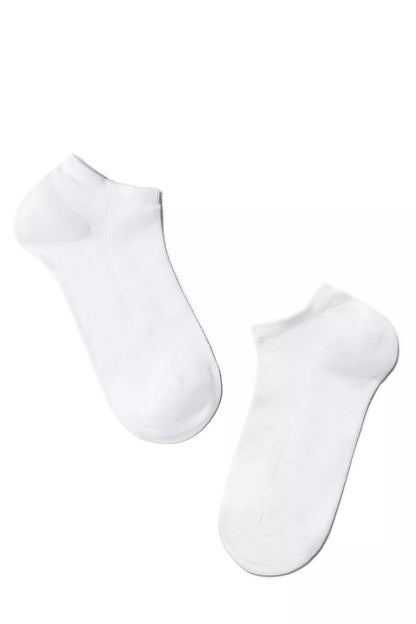 A pair of plain white ankle socks laid out flat against a white background.