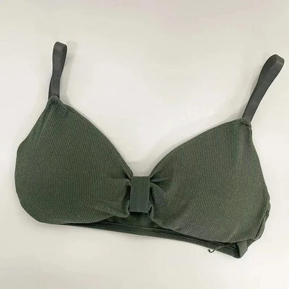 A ribbed, olive green bralette featuring triangular cups and a small vertical fabric detail at the center front.