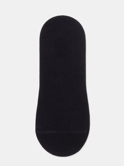 A solid black, low-cut no-show sock presented against a neutral grey background.