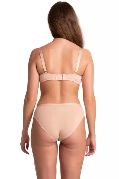 A rear view of a woman wearing a light beige bra with adjustable straps and matching high-cut briefs against a plain white background.