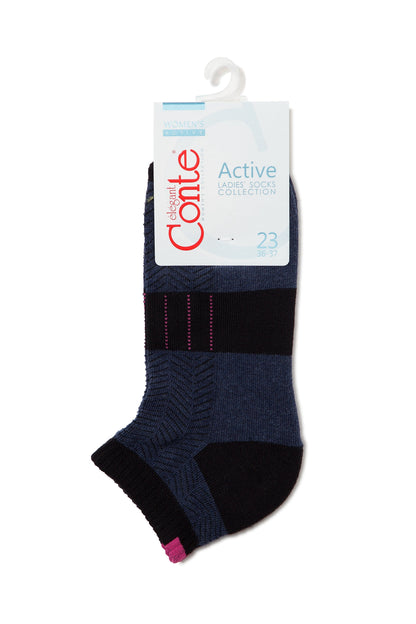 Ankle-length athletic sock with a navy and black striped pattern, featuring a textured knit design, pink accent details at the top and heel, and a white retail hang tag attached at the top.