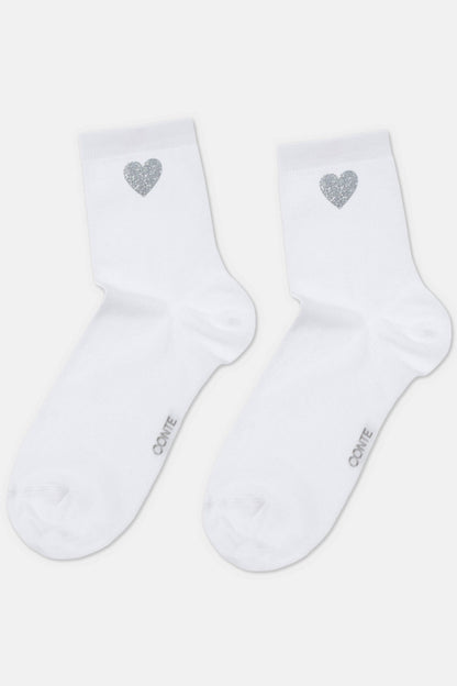 A pair of white ankle socks, each featuring a small, silver glittery heart design on the outer side and the text "CONTE" printed on the foot.