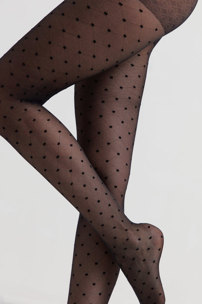 Black sheer pantyhose feature a diamond-shaped grid pattern with small circular dots at each intersection.