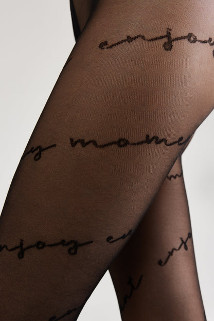 Sheer black tights with a repeating cursive script print across the legs.