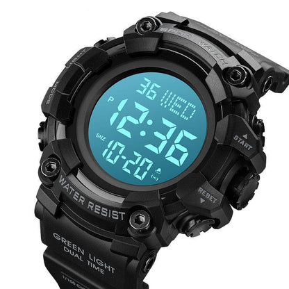 A black digital sports watch with a circular face and glowing blue display showing the time, date, and day of the week, featuring a rugged bezel and a matching black resin strap.