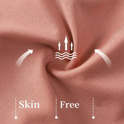 Close-up view of textured fabric in a mauve-pink shade featuring a center graphic of upward-pointing arrows and wavy lines, with the words Skin and Free printed below.