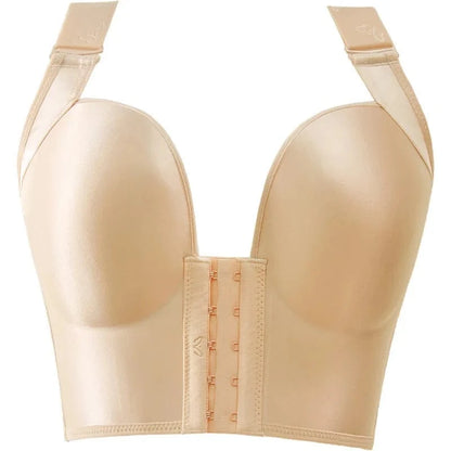 A beige strapless bra with a wide band, molded cups, and a front hook-and-eye closure featuring adjustable shoulder straps.