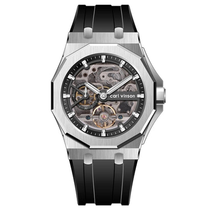 A skeletonized wristwatch featuring a silver-toned octagonal case, a black rubber strap, and exposed inner watch mechanisms under a circular dial with white hour markers.