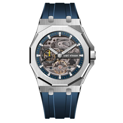 A skeleton watch with a silver octagonal bezel, blue rubber strap, and a visible mechanical movement featuring a yellow second hand.