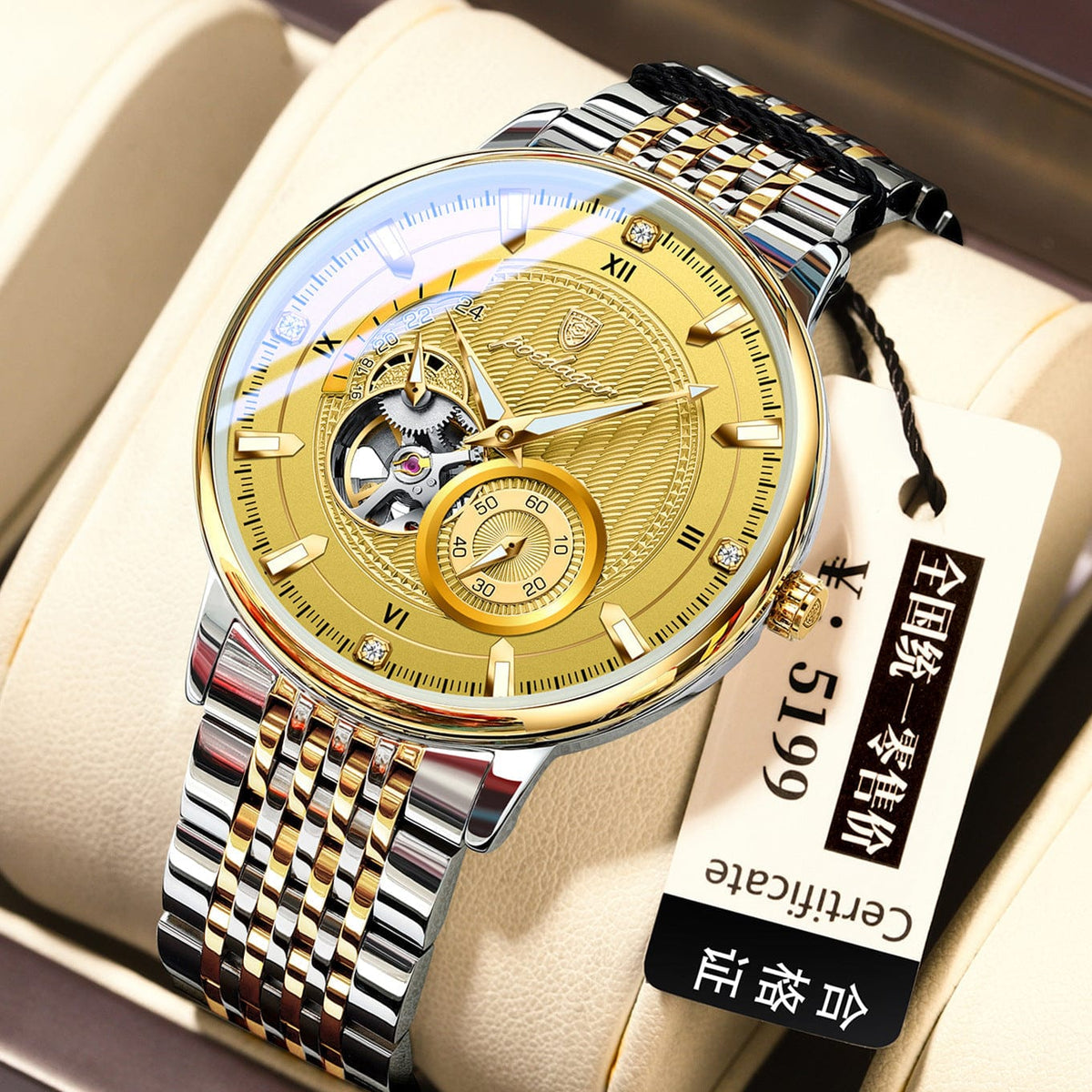 A round mechanical wristwatch features a gold sunburst dial with an open-heart cutout, gold hands and indices with small crystals, and a two-tone silver and gold stainless steel link bracelet.