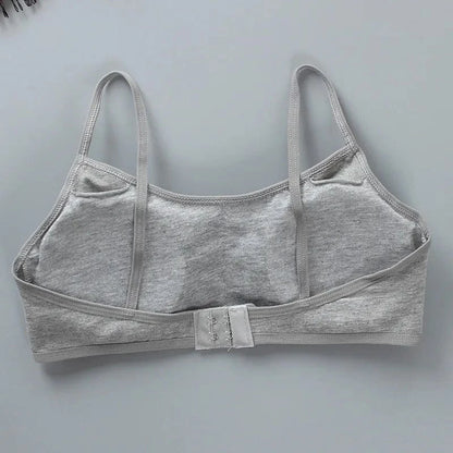 A grey cotton-blend bralette shown from the back, featuring thin shoulder straps and a central metal hook-and-eye closure.