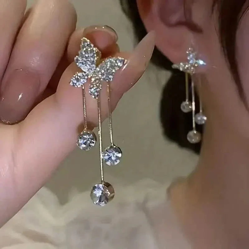 Golden-Tone Alloy Zirconia Dangle Earrings - A-1 Thread Vault