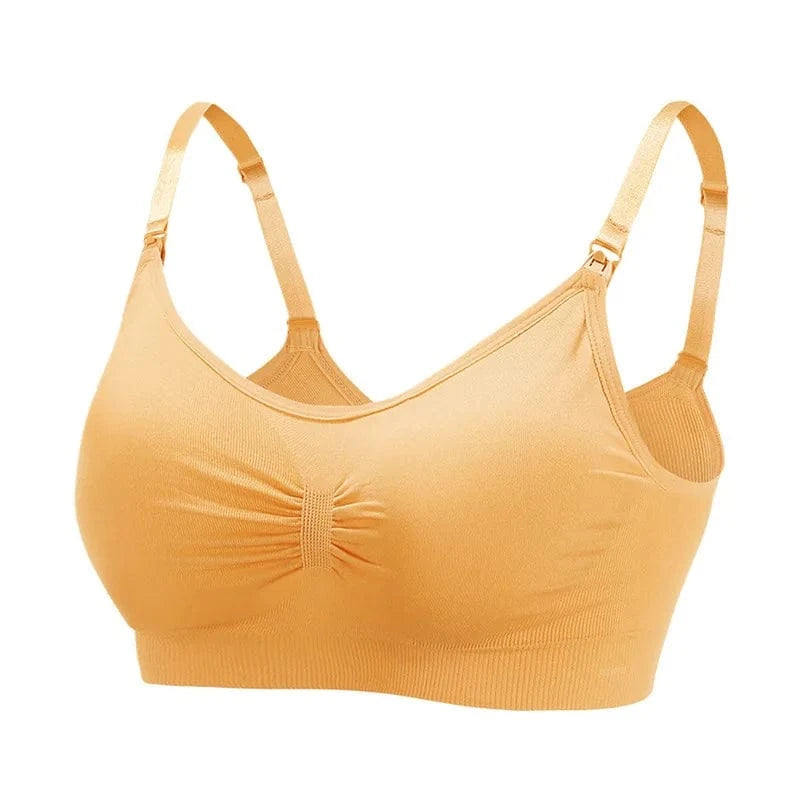 A beige nursing bra featuring a ruched center, adjustable spaghetti straps, and side clips against a white background.