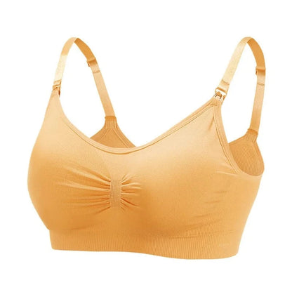 A beige nursing bra featuring a ruched center, adjustable spaghetti straps, and side clips against a white background.