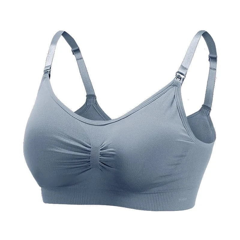 A slate blue wireless nursing bra featuring adjustable shoulder straps with nursing clips, a ruched center detail, and a ribbed underband.