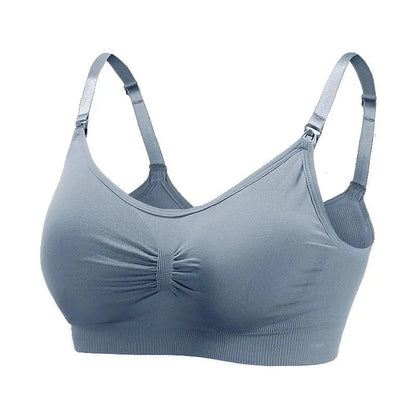 A slate blue wireless nursing bra featuring adjustable shoulder straps with nursing clips, a ruched center detail, and a ribbed underband.