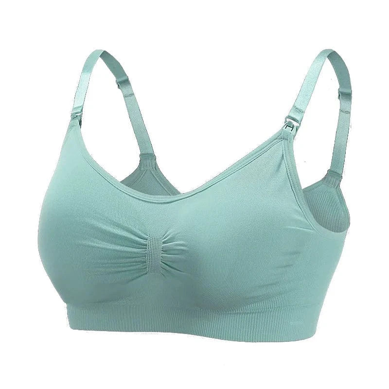 A light teal, wireless nursing bra featuring adjustable spaghetti straps with nursing clips, a ruched center detail, and a ribbed band design.