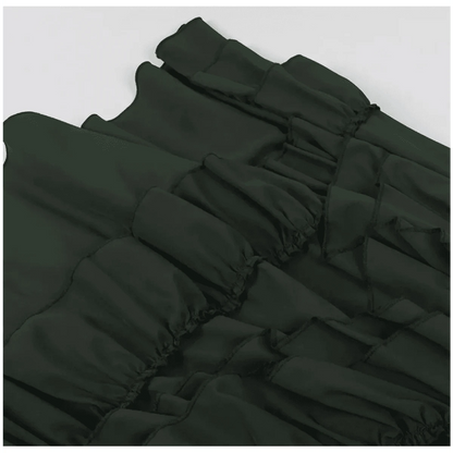 A dark green skirt featuring multiple horizontal tiers of ruffled fabric.