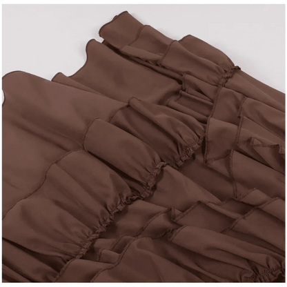 A brown skirt featuring multiple horizontal ruffled tiers with visible stitched seams.