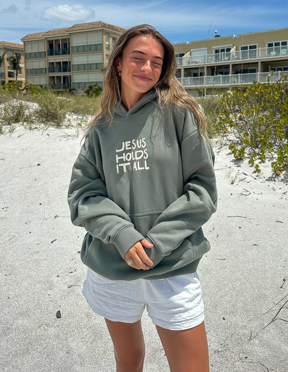 Jesus Holds It All Unisex Hoodie - A-1 Thread Vault