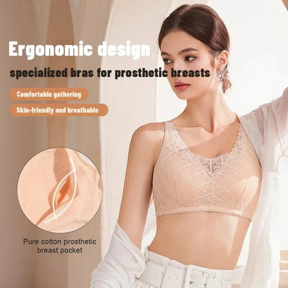 A beige lace bra featuring a built-in pocket in the cup is worn by a woman posing in a bright, sunlit room.