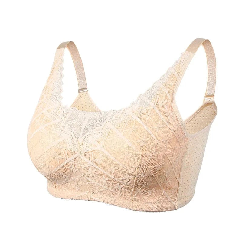 A beige lace bralette featuring wide shoulder straps, a molded cup shape with scalloped edge detailing, and a perforated side panel.