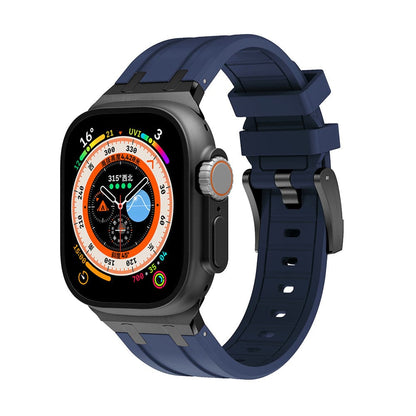 A smartwatch with a rectangular display showing a multi-colored circular gauge interface, paired with a dark blue silicone watch band and a black frame.