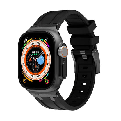 A modern smartwatch with a rectangular display and a matte black silicone strap is shown from a side profile view.