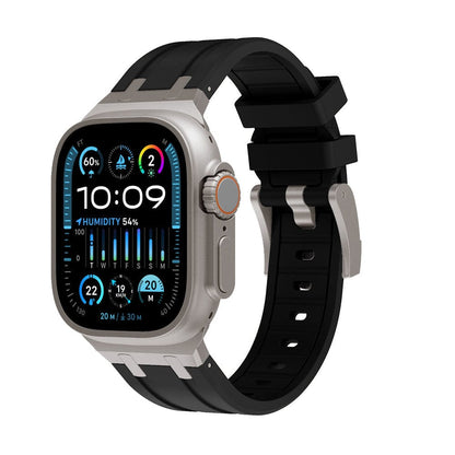 A square smartwatch with a silver metallic frame and a black silicone strap featuring a digital watch face displaying weather, humidity, and time data.