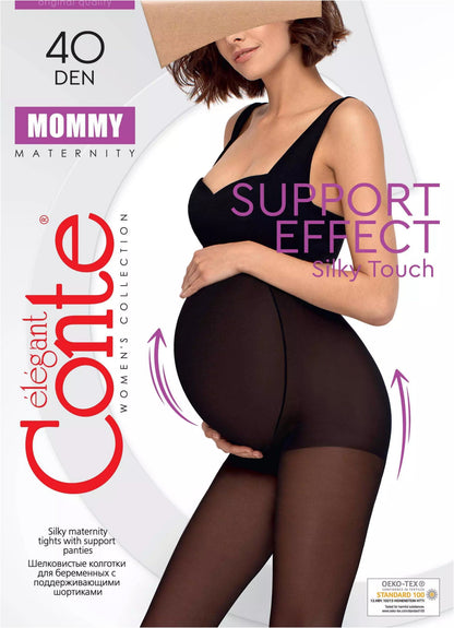 A pregnant woman wearing sheer black maternity tights with a supportive panel over her belly, displayed on product packaging.