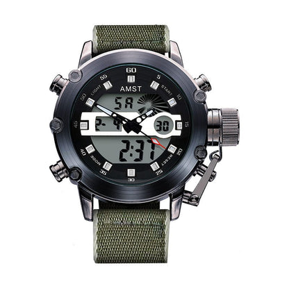 A round analog-digital wristwatch with a black face and bezel, white hands, digital displays, and a textured green fabric strap.