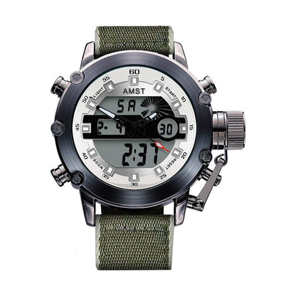 A round, gunmetal-toned wristwatch featuring a white dial with both analog hands and a digital display, set against a green canvas strap.