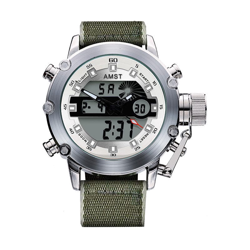 An analog-digital wristwatch with a silver circular case, white face, and olive green fabric strap featuring multiple side buttons and a crown guard.